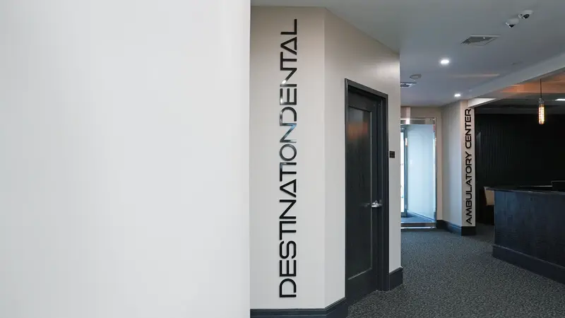 Ambulatory center hallway with Destination Dental signage