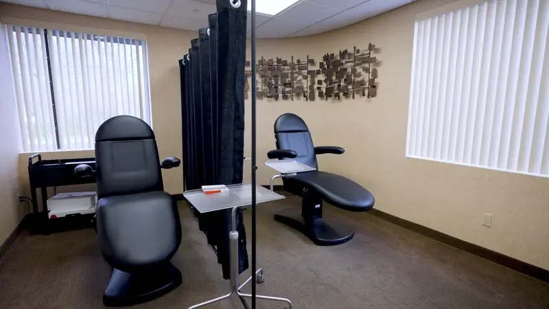 Comfortable treatment room with reclining chairs