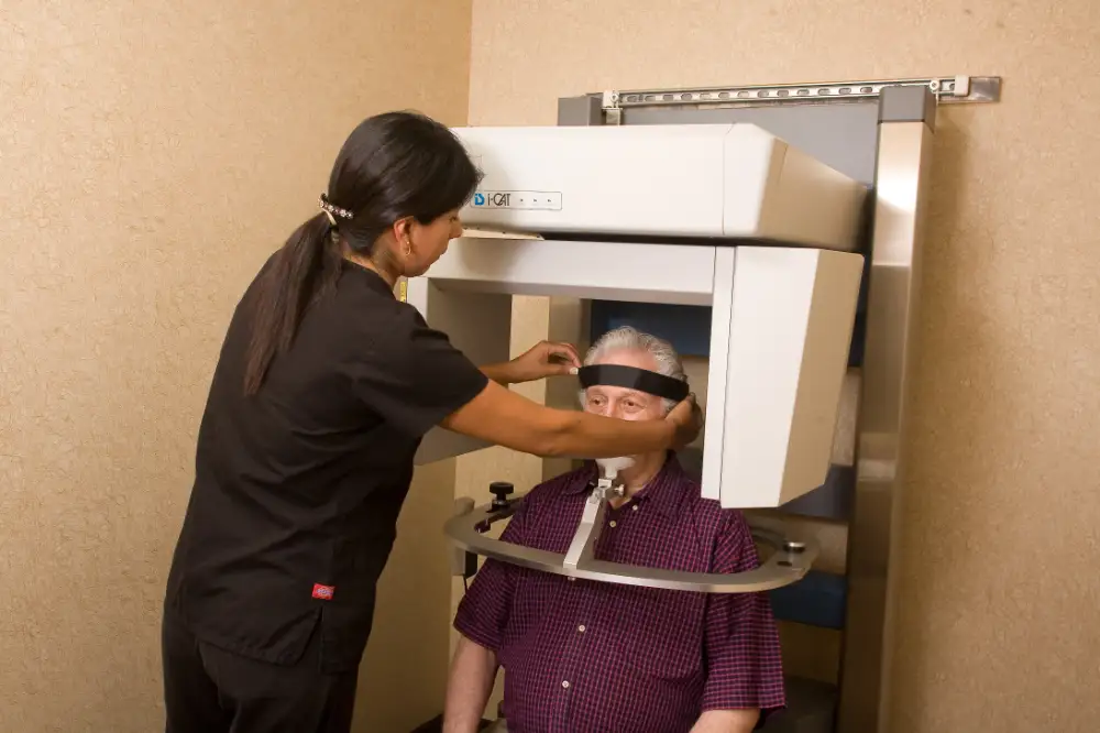 Patient positioned for cone-beam CT imaging
