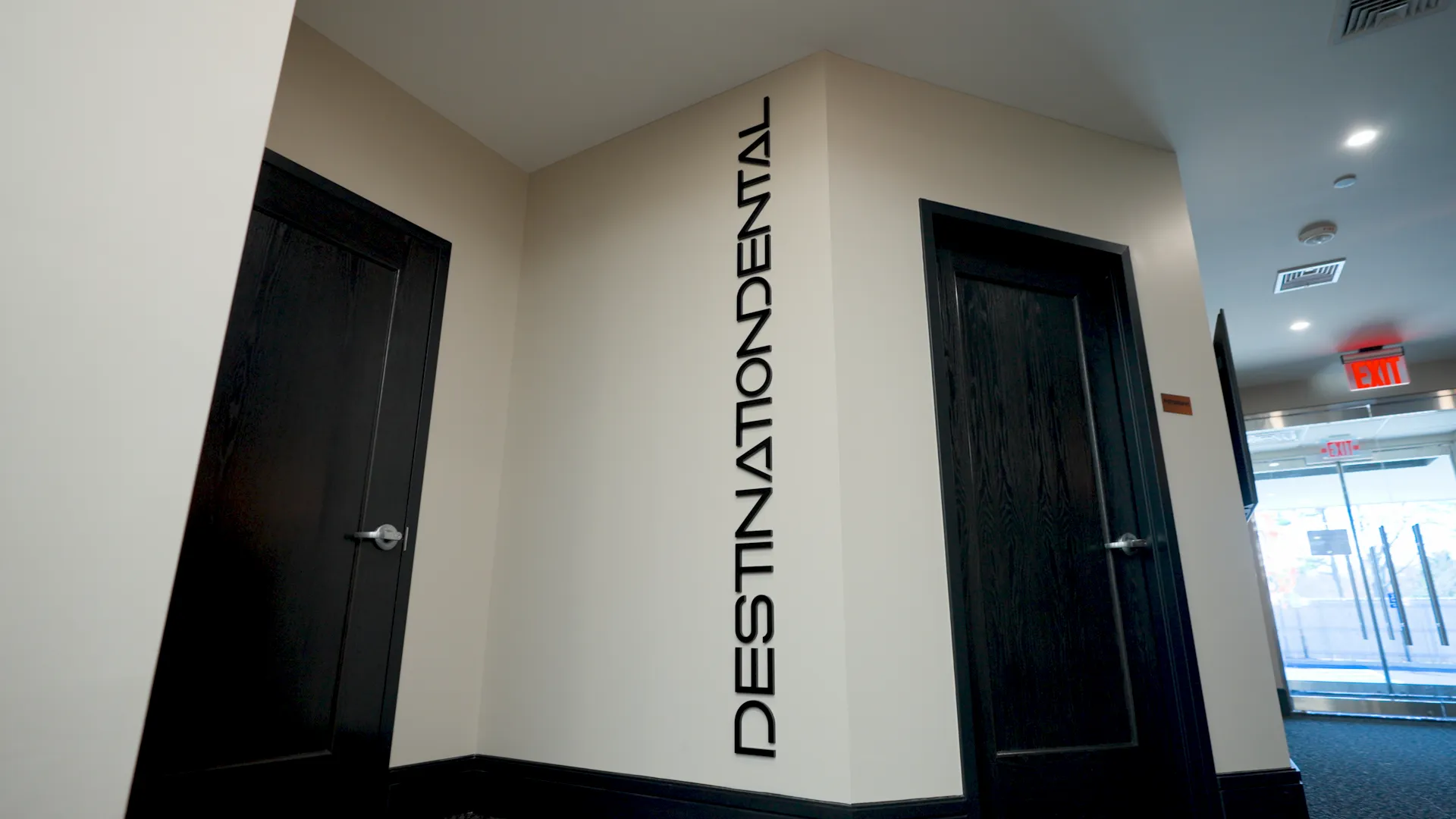 Destination Dental signage in the lobby corridor