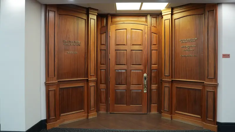 Wood-paneled entrance to the oral surgery suite