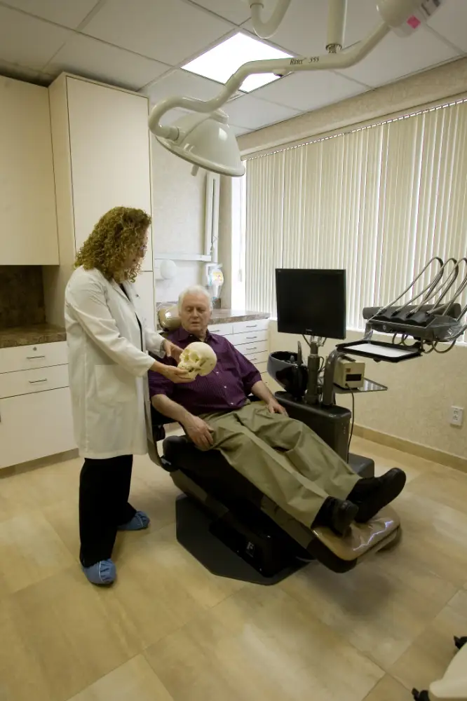 Doctor reviewing anatomy with a patient during consultation
