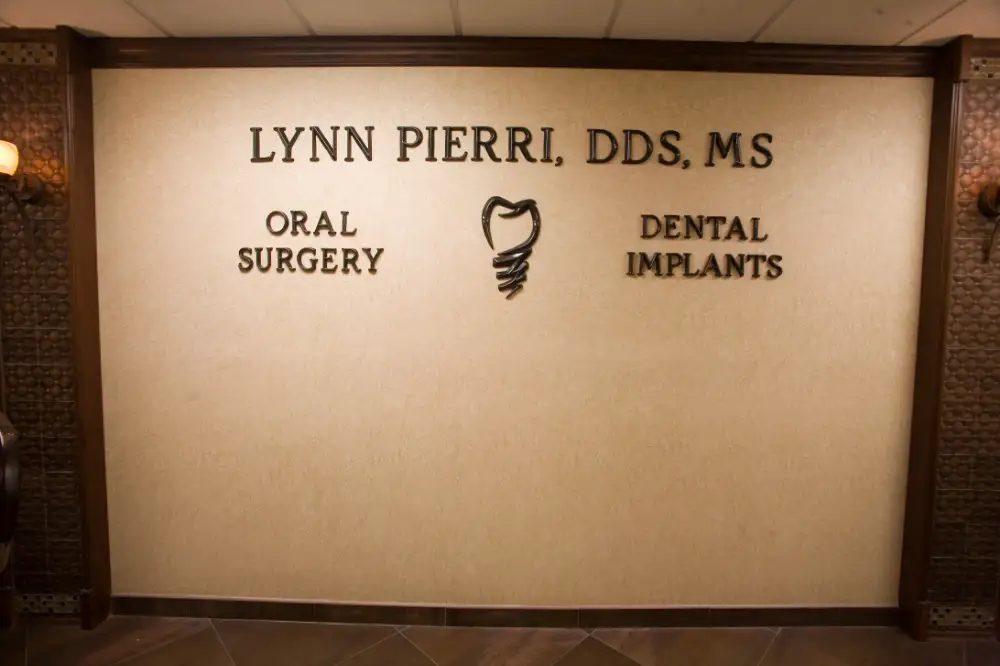 Lynn Pierri, DDS, MS — Oral Surgery and Dental Implants wall sign