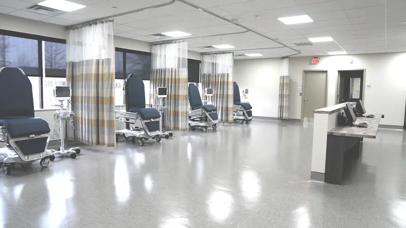 Recovery ward with privacy curtains and nursing station