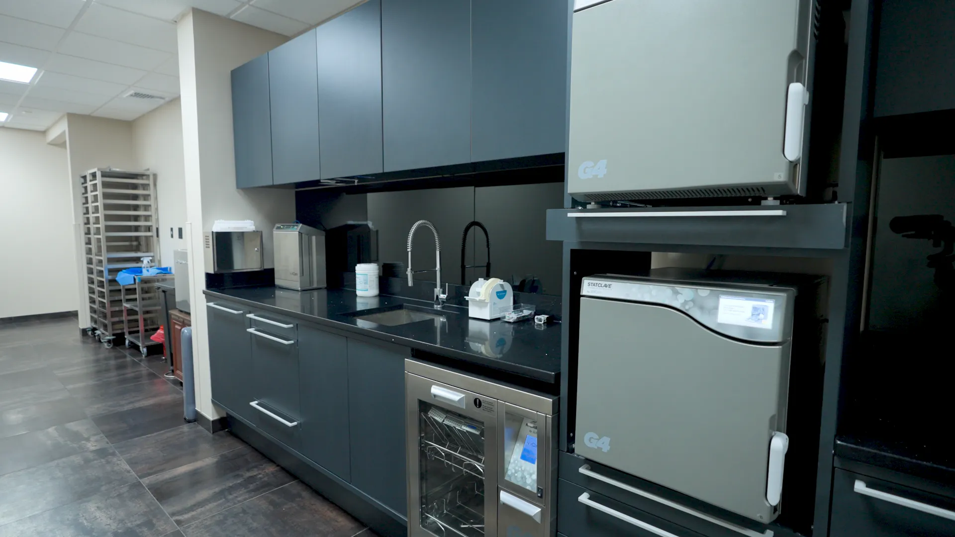 Sterilization center with autoclaves and instrument processing