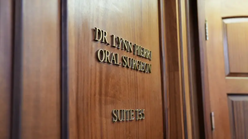 Dr. Lynn Pierri Oral Surgeon Suite 135 door plaque