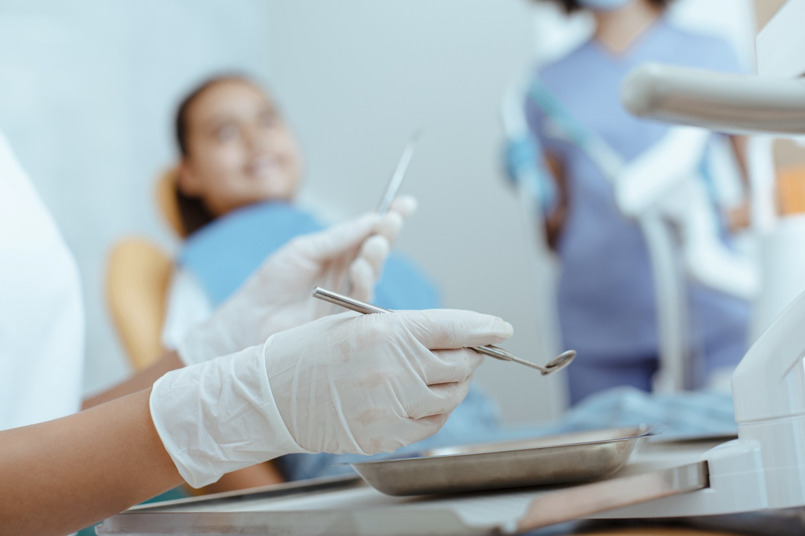 Gentle pediatric dental care with a smiling child in the chair